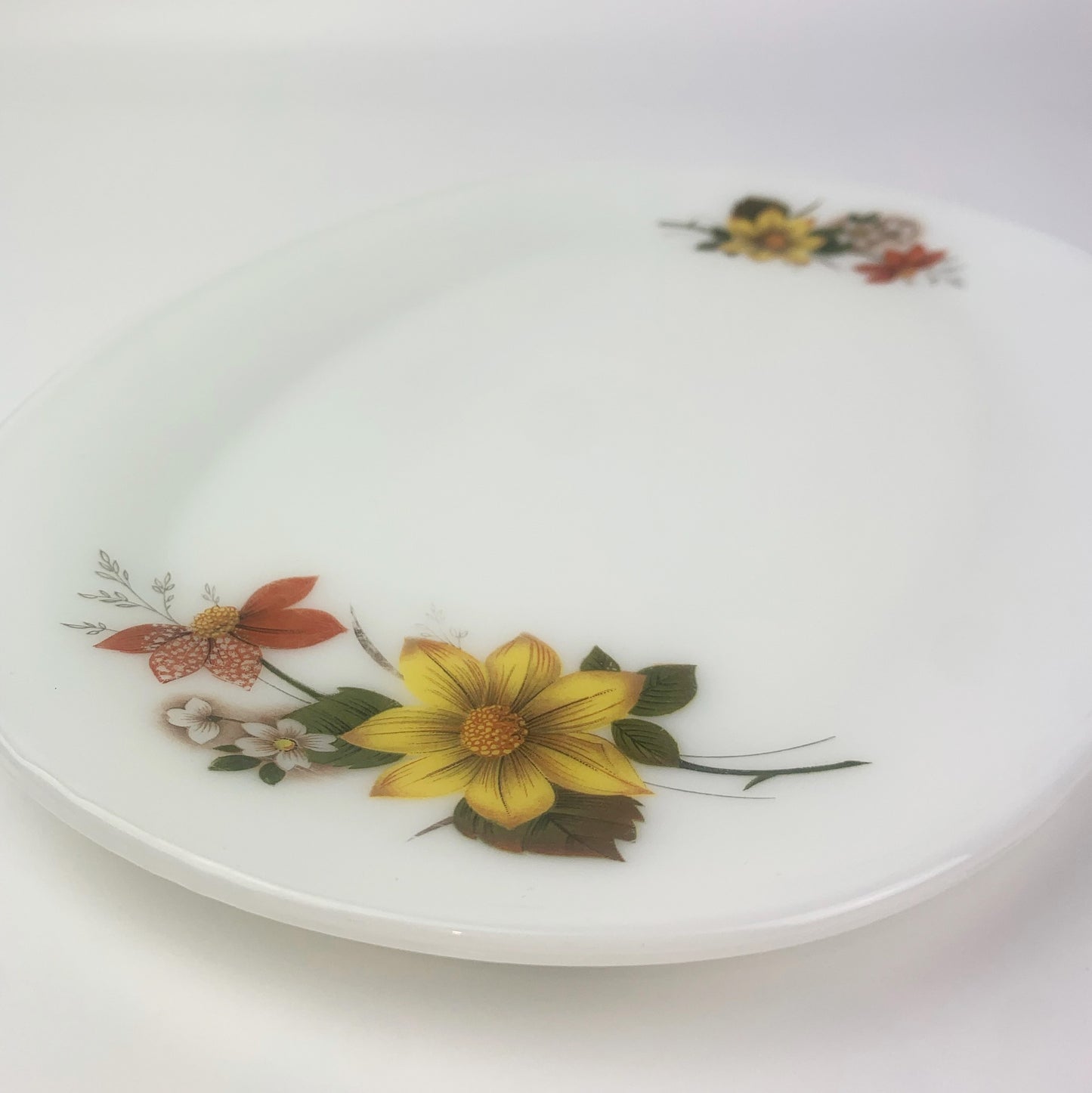 Pyrex oval platter with yellow flower pattern
