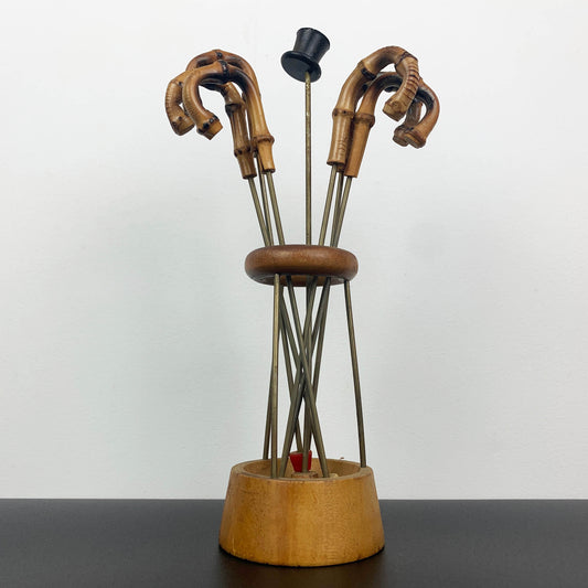 Mid century walking cane drink stirrers in stand
