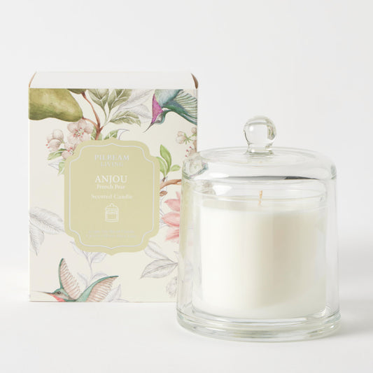 Clear glass cloche candle with floral packaging
