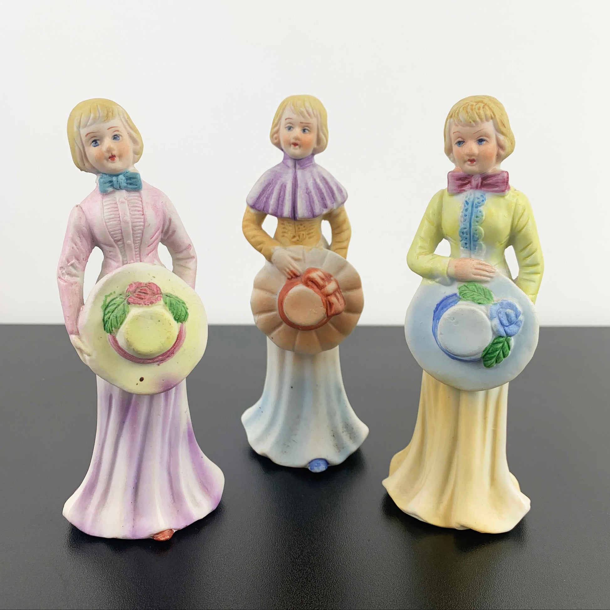 HCF London ladies with hats porcelain figurines - Set of 3