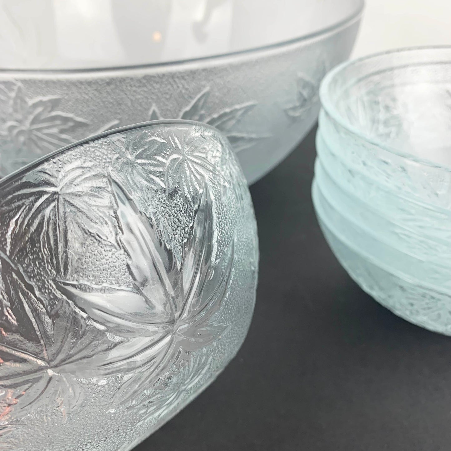 Textured glass bowl with autumn leaf