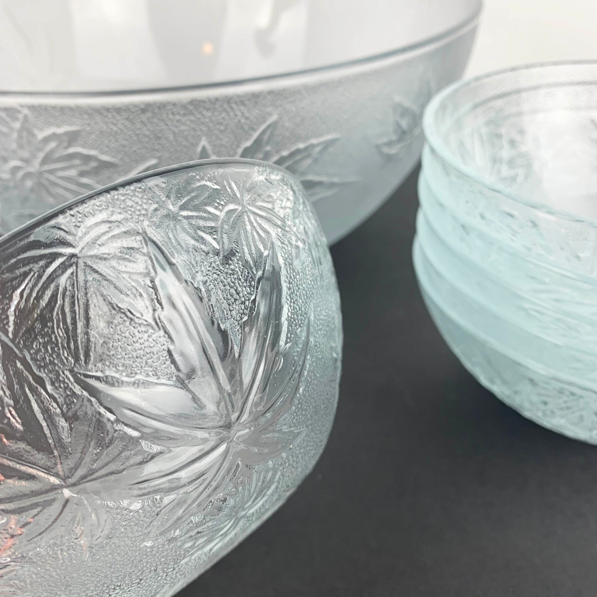 Textured glass bowl with autumn leaf