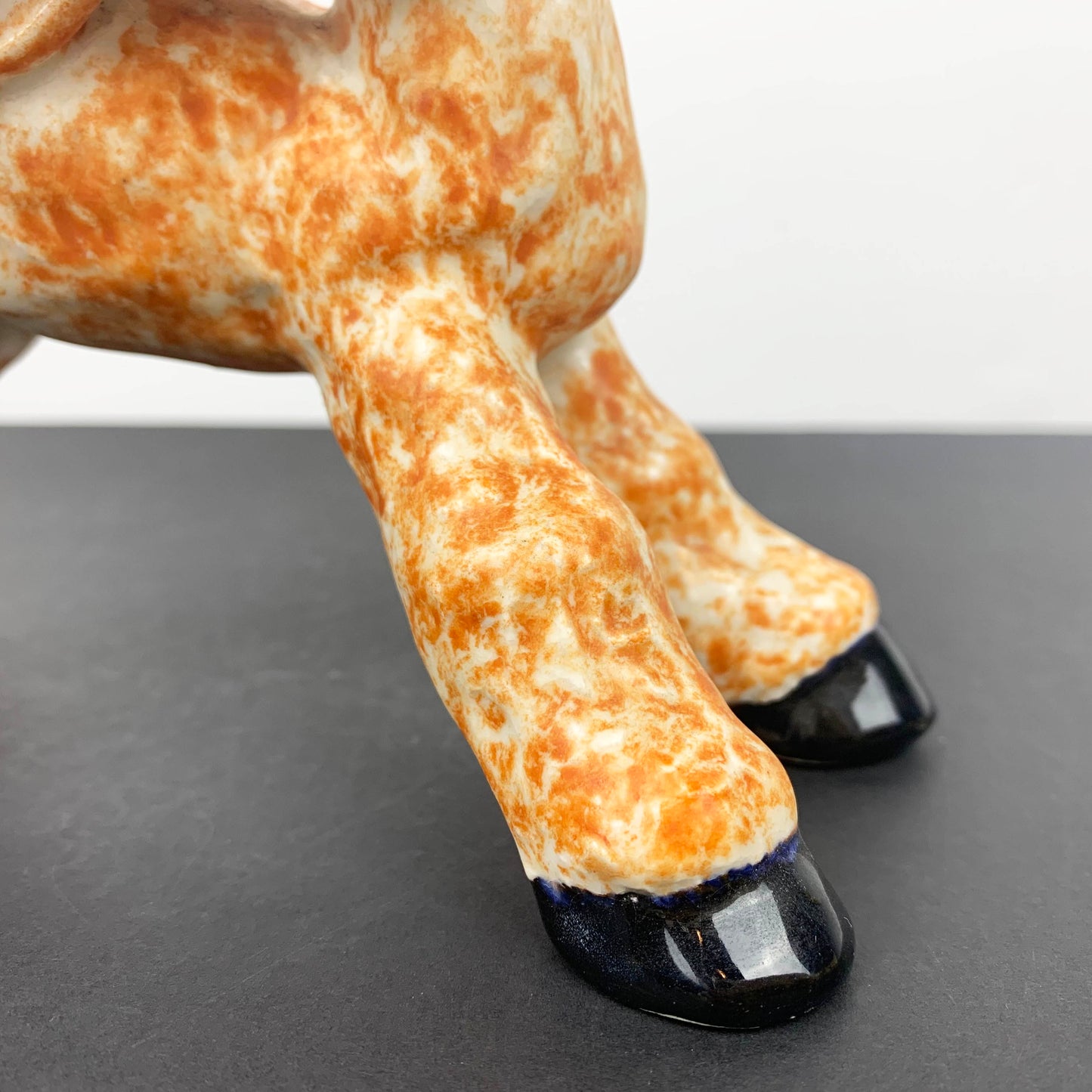 Kooky ceramic lamb figurine hooves