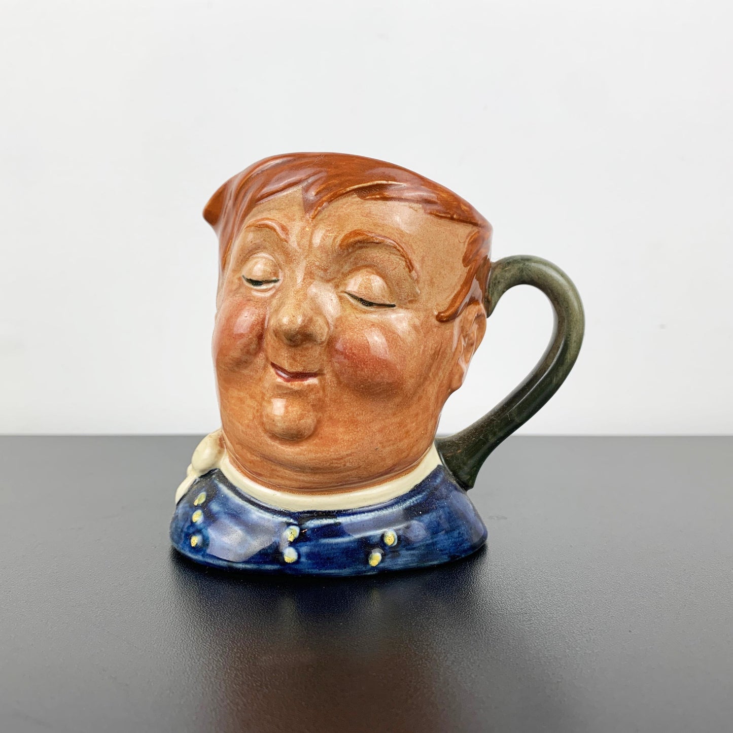 Collectible Royal Doulton mid sized character jug Fat Boy