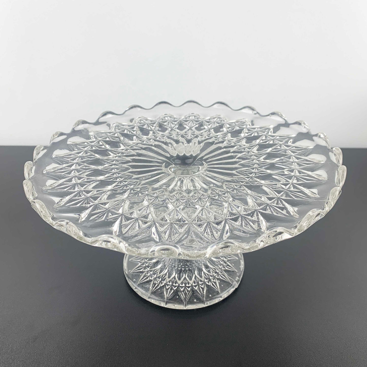 Vintage pressed glass footed cake stand