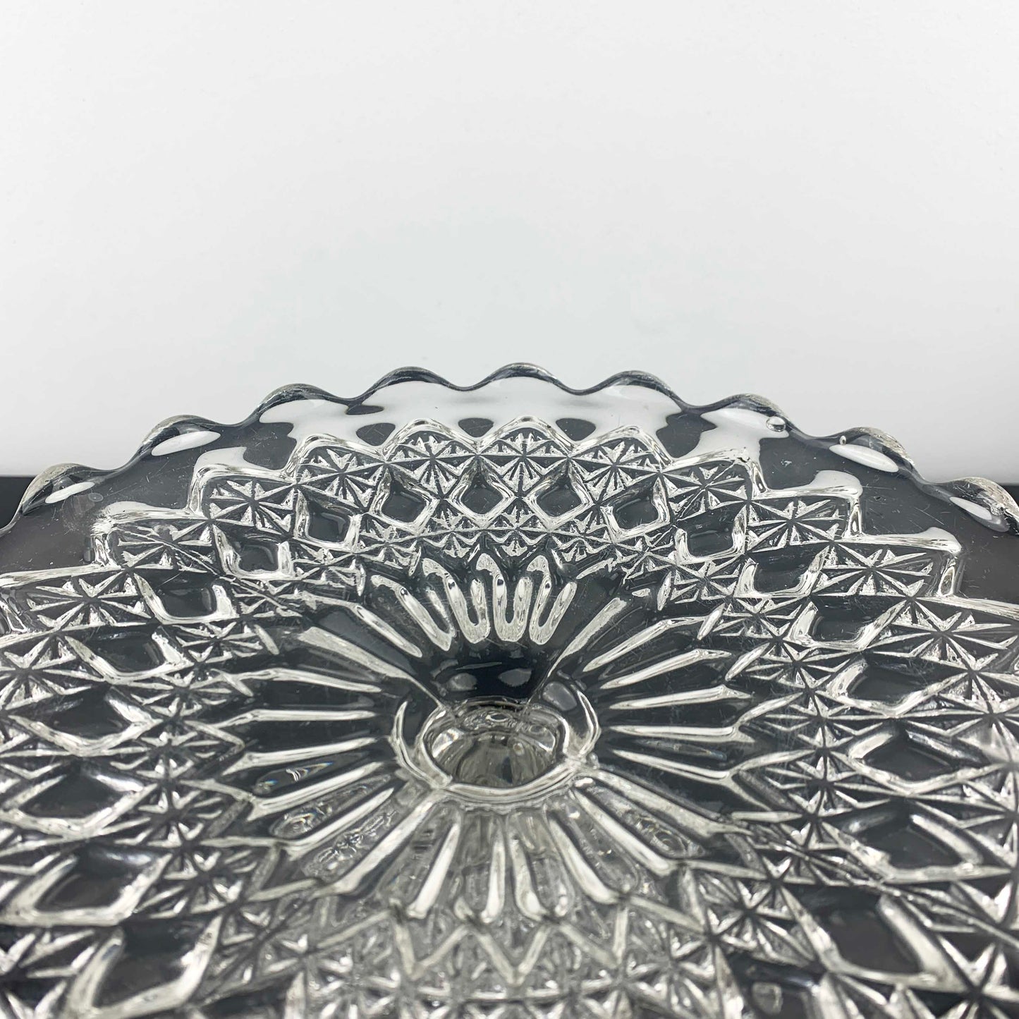 Vintage pressed glass footed cake stand